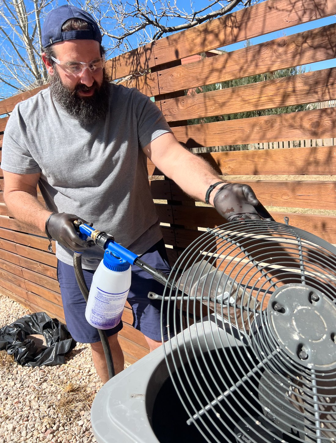 David cleaning condenser coils on the job
